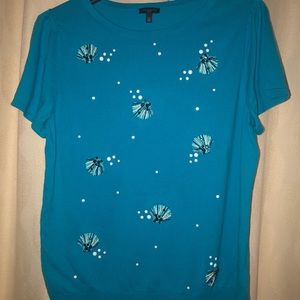 Blue short sleeve with shells